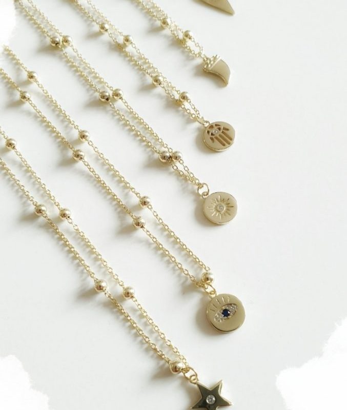 Collar oro colmillo